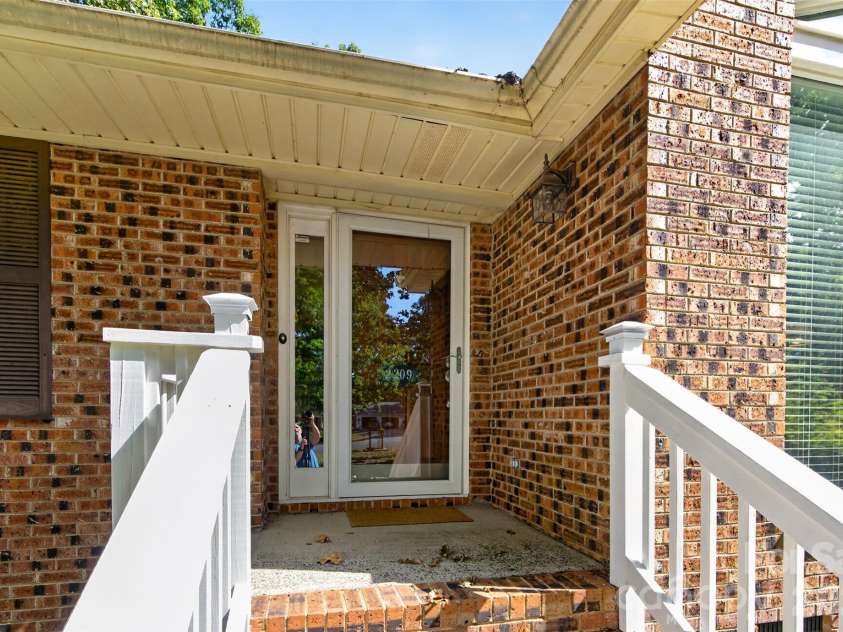 2209 Rainbrook Drive, Monroe, NC 28112.  MLS# CAR4432727, YatesRealty ID 56489. Front porch