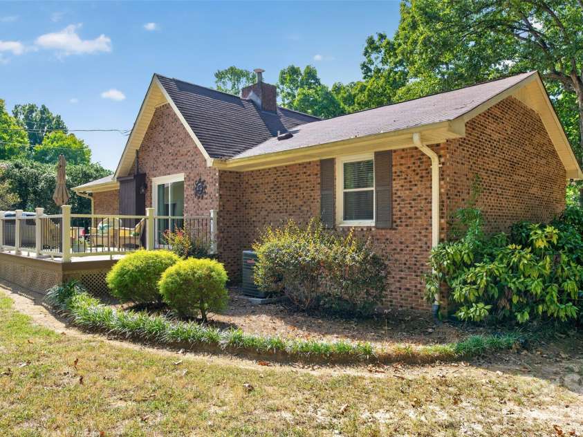 2209 Rainbrook Drive, Monroe, NC 28112.  MLS# CAR4432727, YatesRealty ID 56489. Side view of home