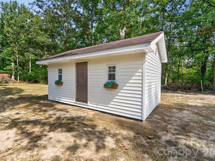 2209 Rainbrook Drive, Monroe, NC 28112.  MLS# CAR4432727, YatesRealty ID 56489. Storage building