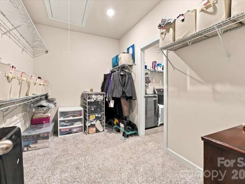 7722 Porrera Street, Charlotte, NC 28214.  MLS# CAR4434037, YatesRealty ID 56499. Primary closet.
