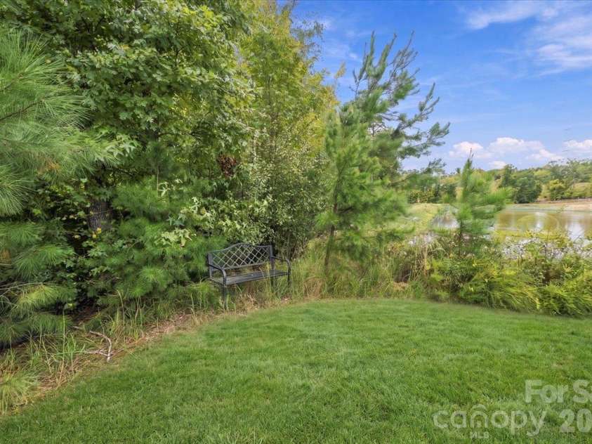 7722 Porrera Street, Charlotte, NC 28214.  MLS# CAR4434037, YatesRealty ID 56499. Private backyard.