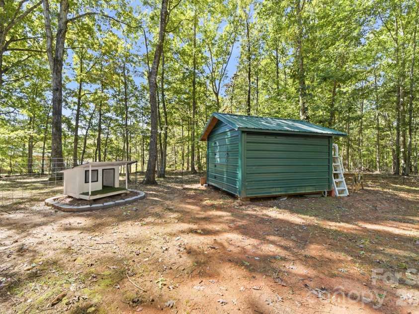 410 Shiloh Unity Road, Lancaster, SC 29720.  MLS# CAR4433993, YatesRealty ID 56502. Doghouse and Shed