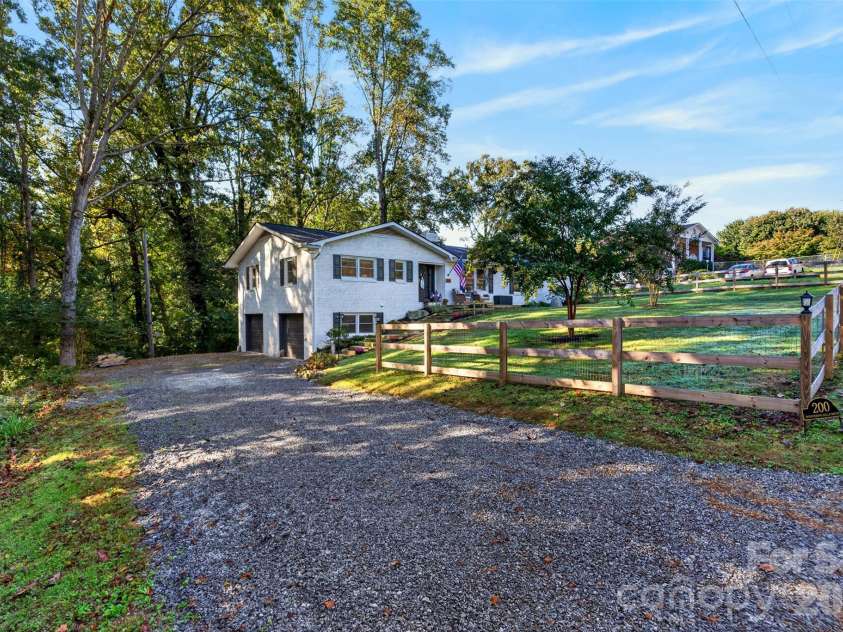 200 Whispering Hills Drive, Hendersonville, NC 28792.  MLS# CAR4429905, YatesRealty ID 56505. 