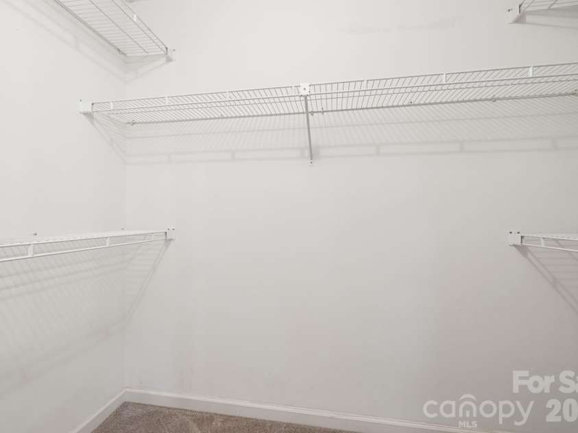 103 Tarragon Place, Flat Rock, NC 28731.  MLS# CAR4432456, YatesRealty ID 56509. Master Walk in closet