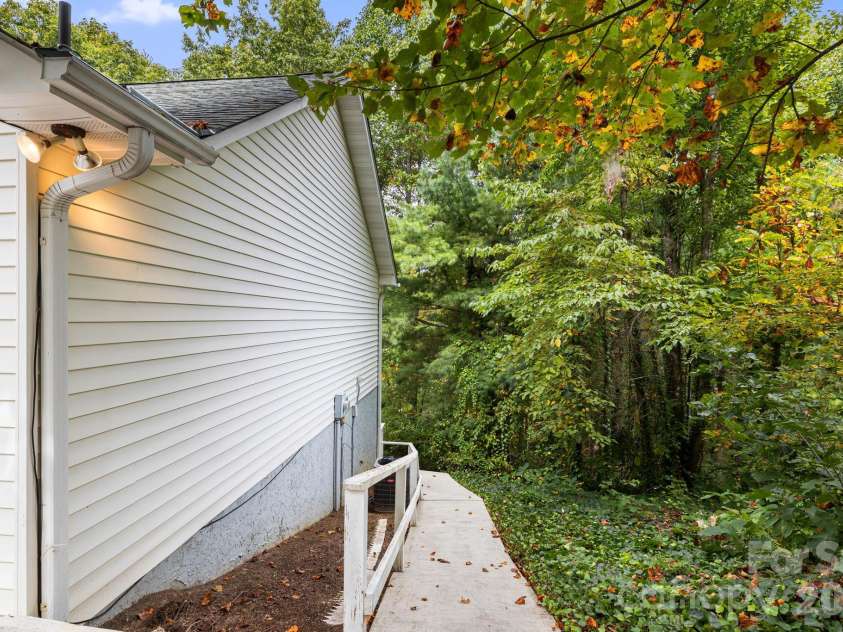 103 Tarragon Place, Flat Rock, NC 28731.  MLS# CAR4432456, YatesRealty ID 56509. Ramp access to basement area.
