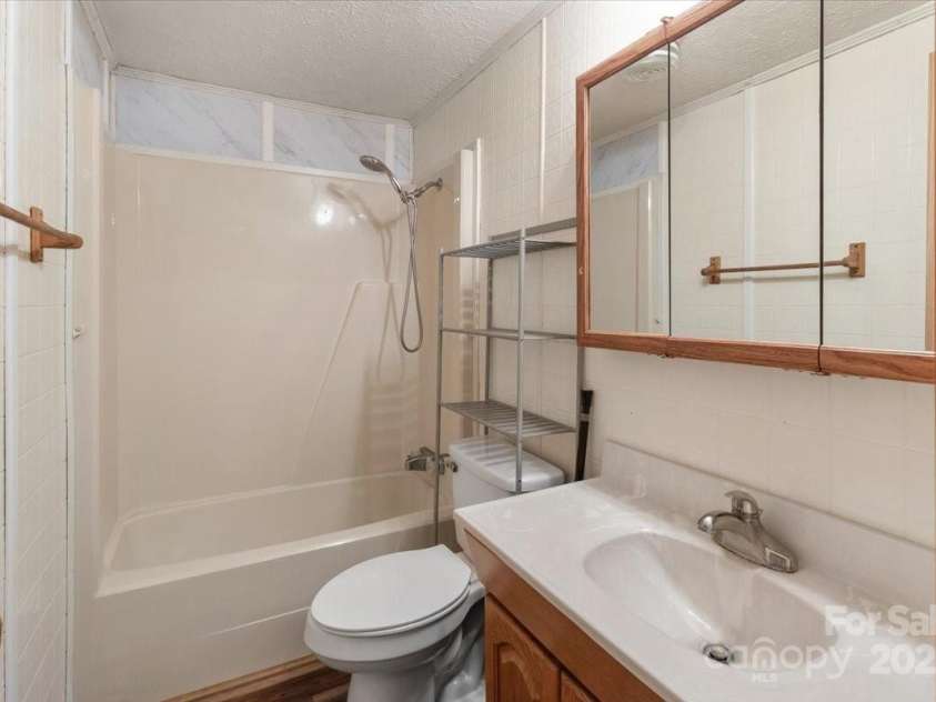 461 Tweed Road, Madison, NC 28753.  MLS# CAR4267871, YatesRealty ID 5652. Bathroom