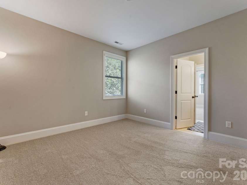 287 Walking Horse Trail, Davidson, NC 28036.  MLS# CAR4432331, YatesRealty ID 56535. Upper Level Bedroom 2 with Shared Bathroom