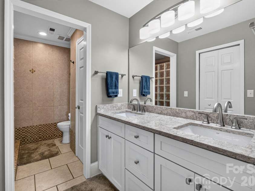 822 Southwest Drive, Davidson, NC 28036.  MLS# CAR4434599, YatesRealty ID 56541. 