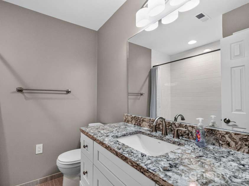 822 Southwest Drive, Davidson, NC 28036.  MLS# CAR4434599, YatesRealty ID 56541. 