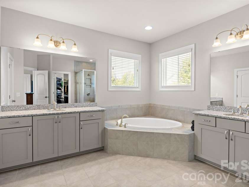1557 Cedar Park Drive, Pineville, NC 28134.  MLS# CAR4432932, YatesRealty ID 56547. Double Vanities in Primary Bath