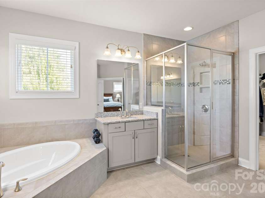 1557 Cedar Park Drive, Pineville, NC 28134.  MLS# CAR4432932, YatesRealty ID 56547. Oversized Soaking Tub and Glass Enclosed Shower