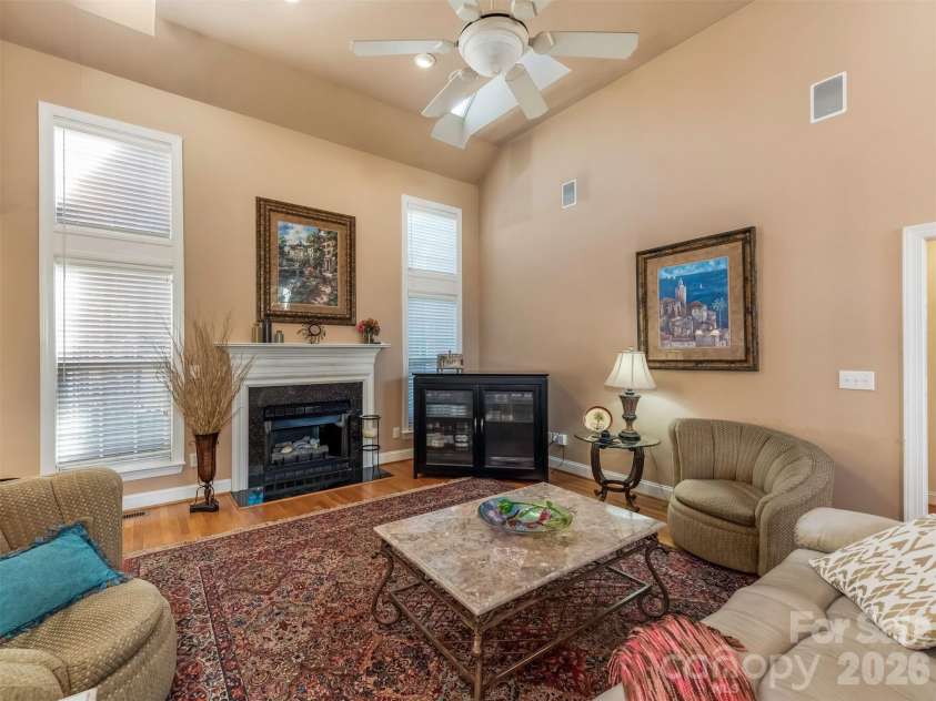 714 Corinthian Place, Charlotte, NC 28211.  MLS# CAR4430064, YatesRealty ID 56576. Great room with fireplace