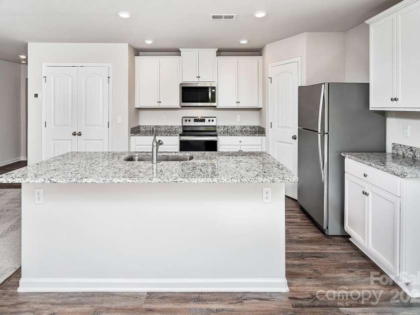 5617 Skinny Drive, Charlotte, NC 28215.  MLS# CAR4237396, YatesRealty ID 5662. Digital image similar