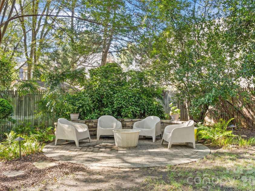 5132 Camilla Drive, Charlotte, NC 28226.  MLS# CAR4432368, YatesRealty ID 56620. Fire pit area