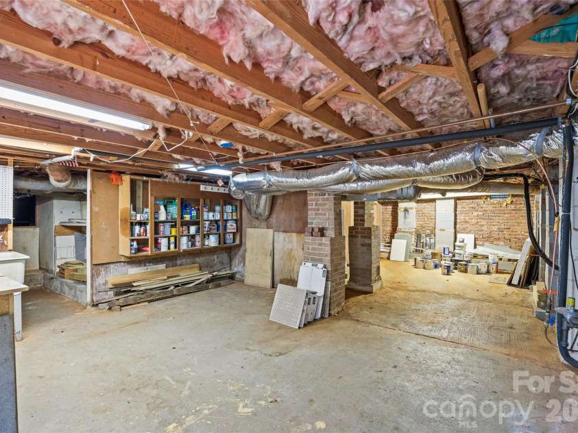 5132 Camilla Drive, Charlotte, NC 28226.  MLS# CAR4432368, YatesRealty ID 56620. Walk-in Crawl with concrete floors