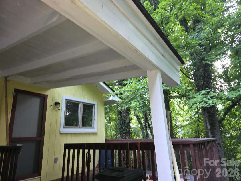 121 Carolina Drive, Tryon, NC 28782.  MLS# CAR4434828, YatesRealty ID 56622. Carport 1:1