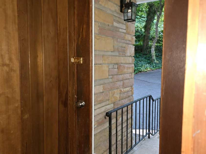121 Carolina Drive, Tryon, NC 28782.  MLS# CAR4434828, YatesRealty ID 56622. Front Entry in Unit with 2 bed 2 bath