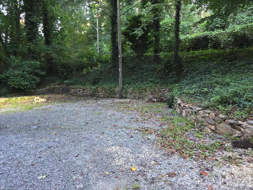 121 Carolina Drive, Tryon, NC 28782.  MLS# CAR4434828, YatesRealty ID 56622. Parking area