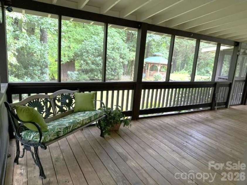 177 Natural Trail, Sylva, NC 28779.  MLS# CAR4434524, YatesRealty ID 56632. Covered porch