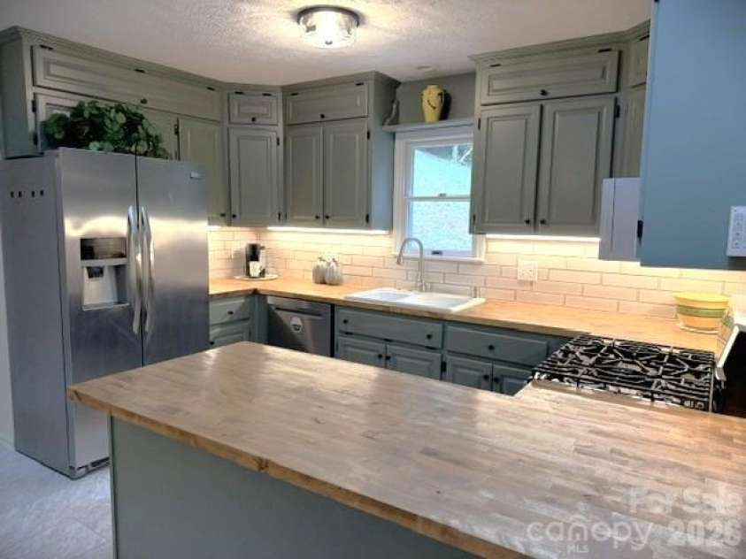177 Natural Trail, Sylva, NC 28779.  MLS# CAR4434524, YatesRealty ID 56632. Kitchen cabinets recently painted and new countertops