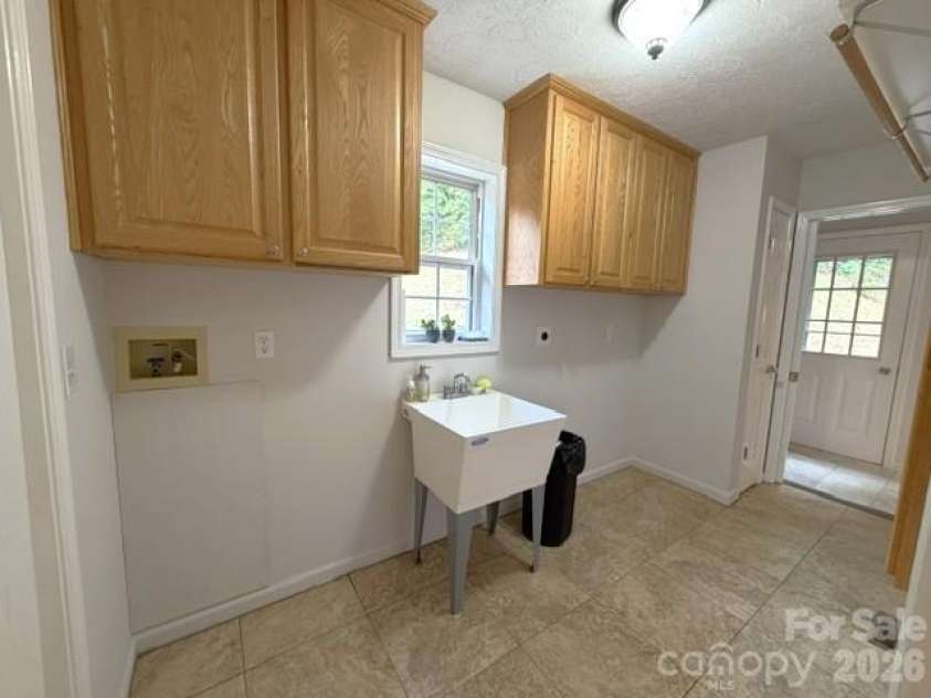 177 Natural Trail, Sylva, NC 28779.  MLS# CAR4434524, YatesRealty ID 56632. Laundry
