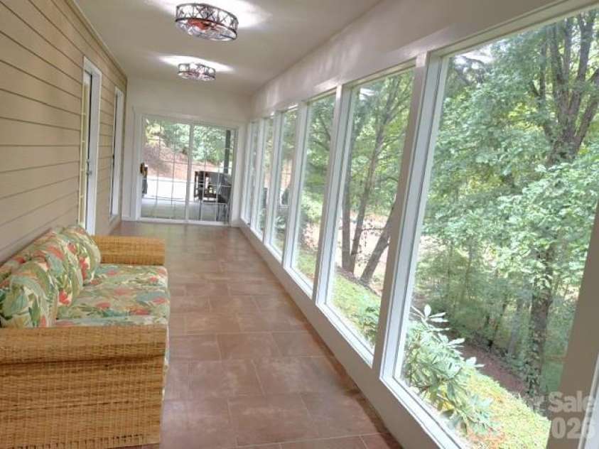 177 Natural Trail, Sylva, NC 28779.  MLS# CAR4434524, YatesRealty ID 56632. Sunroom