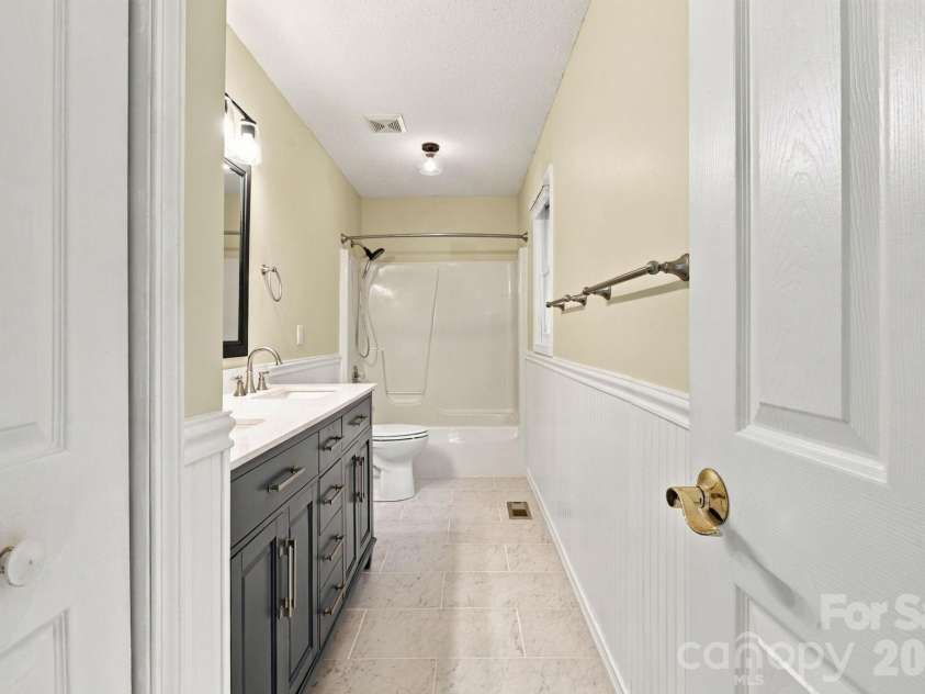 1270 Berra Place, Hickory, NC 28602.  MLS# CAR4433437, YatesRealty ID 56636. Lower level primary bathroom
