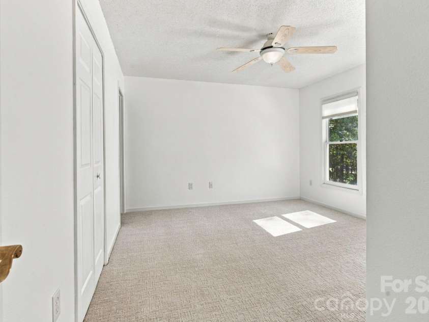 1270 Berra Place, Hickory, NC 28602.  MLS# CAR4433437, YatesRealty ID 56636. Lower level primary bedroom
