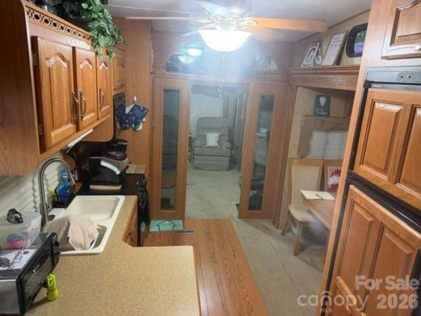 115 Sleepy Cove Trail, Mount Gilead, NC 27306.  MLS# CAR4434860, YatesRealty ID 56637. Addtl Kitchen View