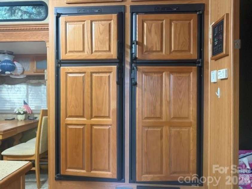 115 Sleepy Cove Trail, Mount Gilead, NC 27306.  MLS# CAR4434860, YatesRealty ID 56637. Double Refrigerator