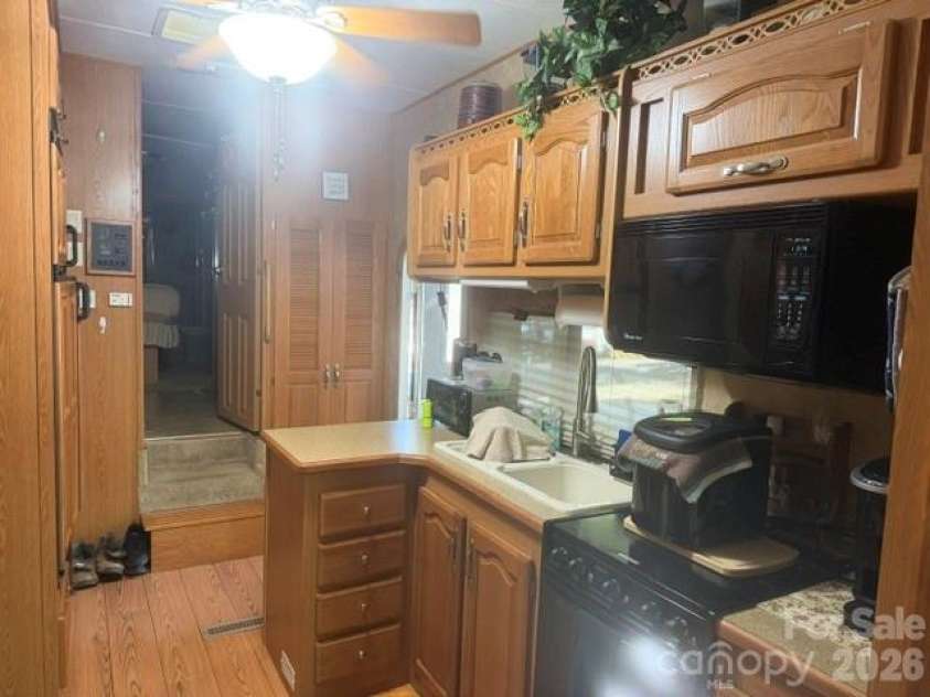 115 Sleepy Cove Trail, Mount Gilead, NC 27306.  MLS# CAR4434860, YatesRealty ID 56637. Kitchen View
