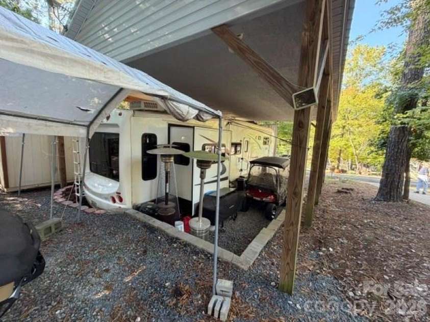 115 Sleepy Cove Trail, Mount Gilead, NC 27306.  MLS# CAR4434860, YatesRealty ID 56637. Side View