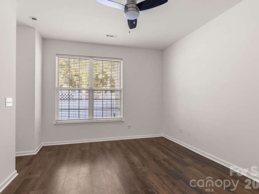 701 Shellstone Place, Fort Mill, SC 29708.  MLS# CAR4434041, YatesRealty ID 56645. Spacious downstairs primary bedroom_1