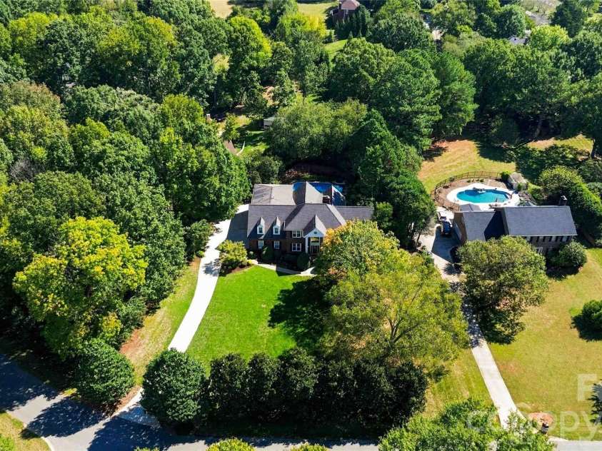 4301 Horseshoe Bend, Matthews, NC 28104.  MLS# CAR4431860, YatesRealty ID 56646. 