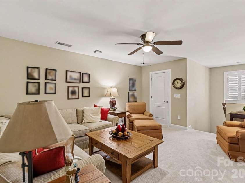 1567 Tranquility Boulevard, Lancaster, SC 29720.  MLS# CAR4433825, YatesRealty ID 56650. Upstairs bonus areahas a storage closet with custom shelves  and 2 additional attic storage areas
