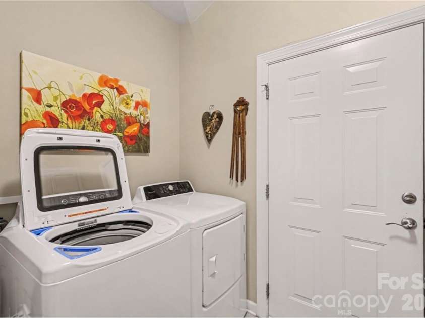 1567 Tranquility Boulevard, Lancaster, SC 29720.  MLS# CAR4433825, YatesRealty ID 56650. Washer and Dryer Convey