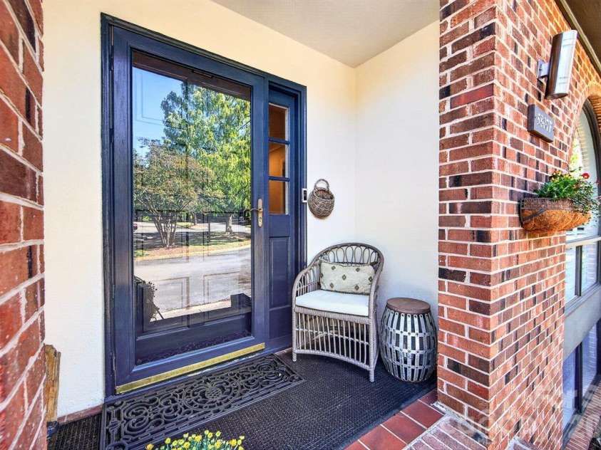 5807 Sharon Road, Charlotte, NC 28210.  MLS# CAR4434151, YatesRealty ID 56666. Front Porch