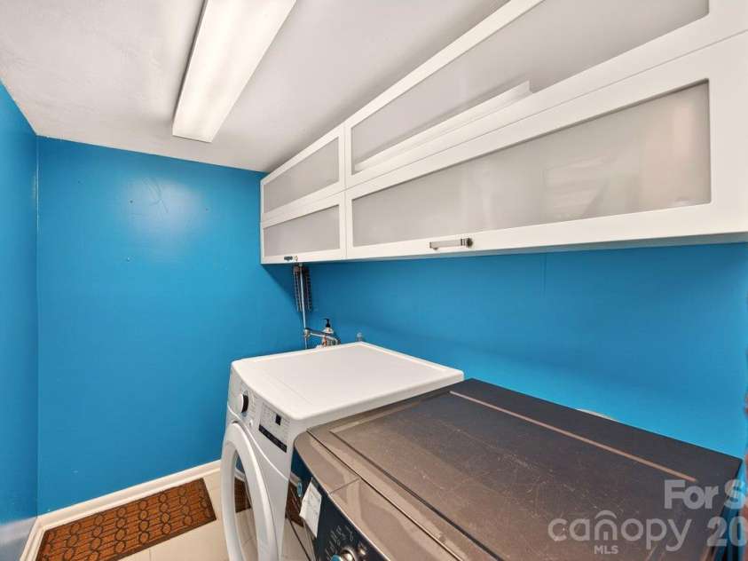 5807 Sharon Road, Charlotte, NC 28210.  MLS# CAR4434151, YatesRealty ID 56666. Laundry Room