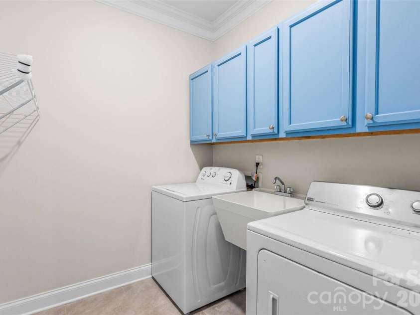4300 Legacy Drive, Denver, NC 28037.  MLS# CAR4432619, YatesRealty ID 56669. Walk in Laundry room with cabinets & sink!