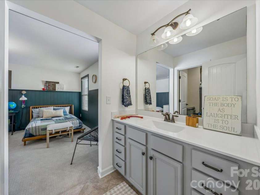 1219 Arges River Drive, Fort Mill, SC 29715.  MLS# CAR4432365, YatesRealty ID 56676. Bathroom connected Bedrooms Three and Four