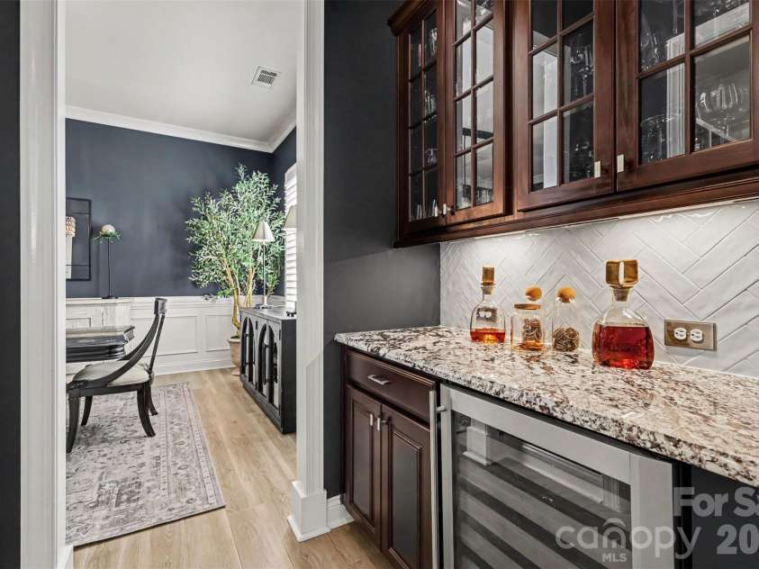 726 Kathy Dianne Drive, Fort Mill, SC 29707.  MLS# CAR4430162, YatesRealty ID 56699. Butler Pantry with a beverage refrigerator