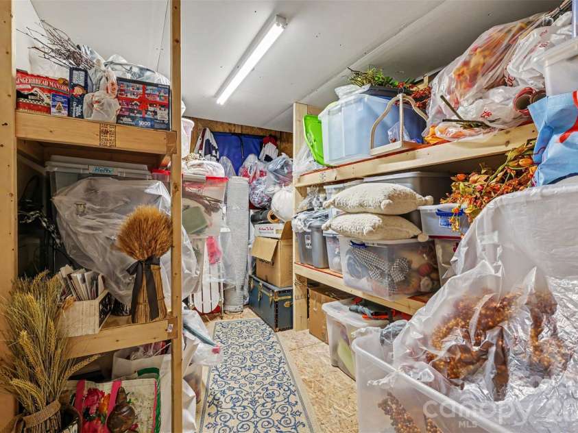 726 Kathy Dianne Drive, Fort Mill, SC 29707.  MLS# CAR4430162, YatesRealty ID 56699. Second walk in storage with shelving