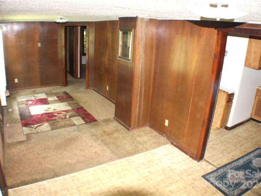 215 Merchant Street, Asheville, NC 28803.  MLS# CAR4165656, YatesRealty ID 567. Dining room area/living room