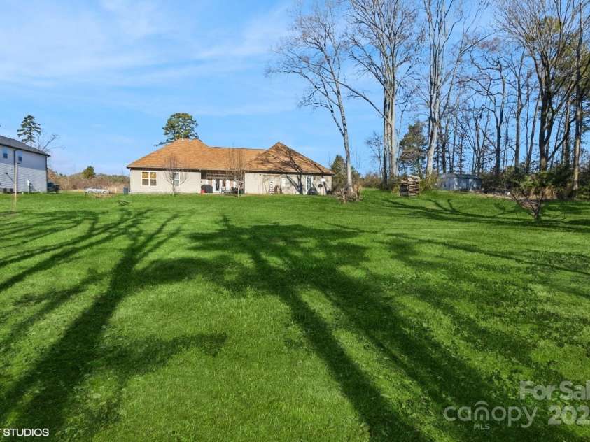 1808 Wilton Gate Drive, Charlotte, NC 28262.  MLS# CAR4203394, YatesRealty ID 5670. Backyard