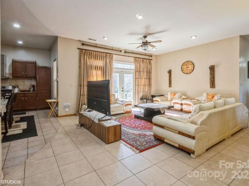 1808 Wilton Gate Drive, Charlotte, NC 28262.  MLS# CAR4203394, YatesRealty ID 5670. Family room/common area