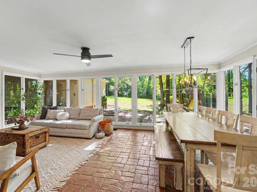 607 Anderson Avenue, Salisbury, NC 28144.  MLS# CAR4429021, YatesRealty ID 56703. Expansive windows surround this stunning sunroom