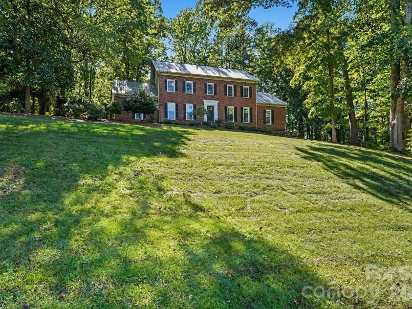 607 Anderson Avenue, Salisbury, NC 28144.  MLS# CAR4429021, YatesRealty ID 56703. Set above an expansive front lawn this stately home make a beautiful first impression