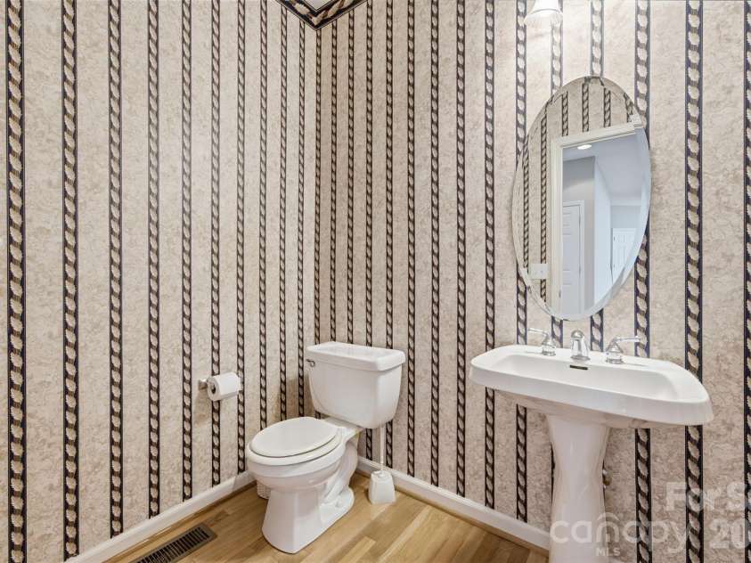 6211 Chavel Lane, Charlotte, NC 28269.  MLS# CAR4430690, YatesRealty ID 56704. Oversized powder room (could be converted to a full bath)