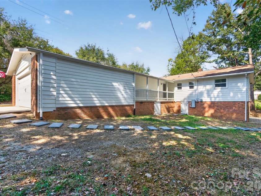 4501 Flowes Store Road, Concord, NC 28025.  MLS# CAR4429896, YatesRealty ID 56705. Backyard