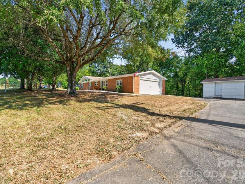 4501 Flowes Store Road, Concord, NC 28025.  MLS# CAR4429896, YatesRealty ID 56705. Driveway